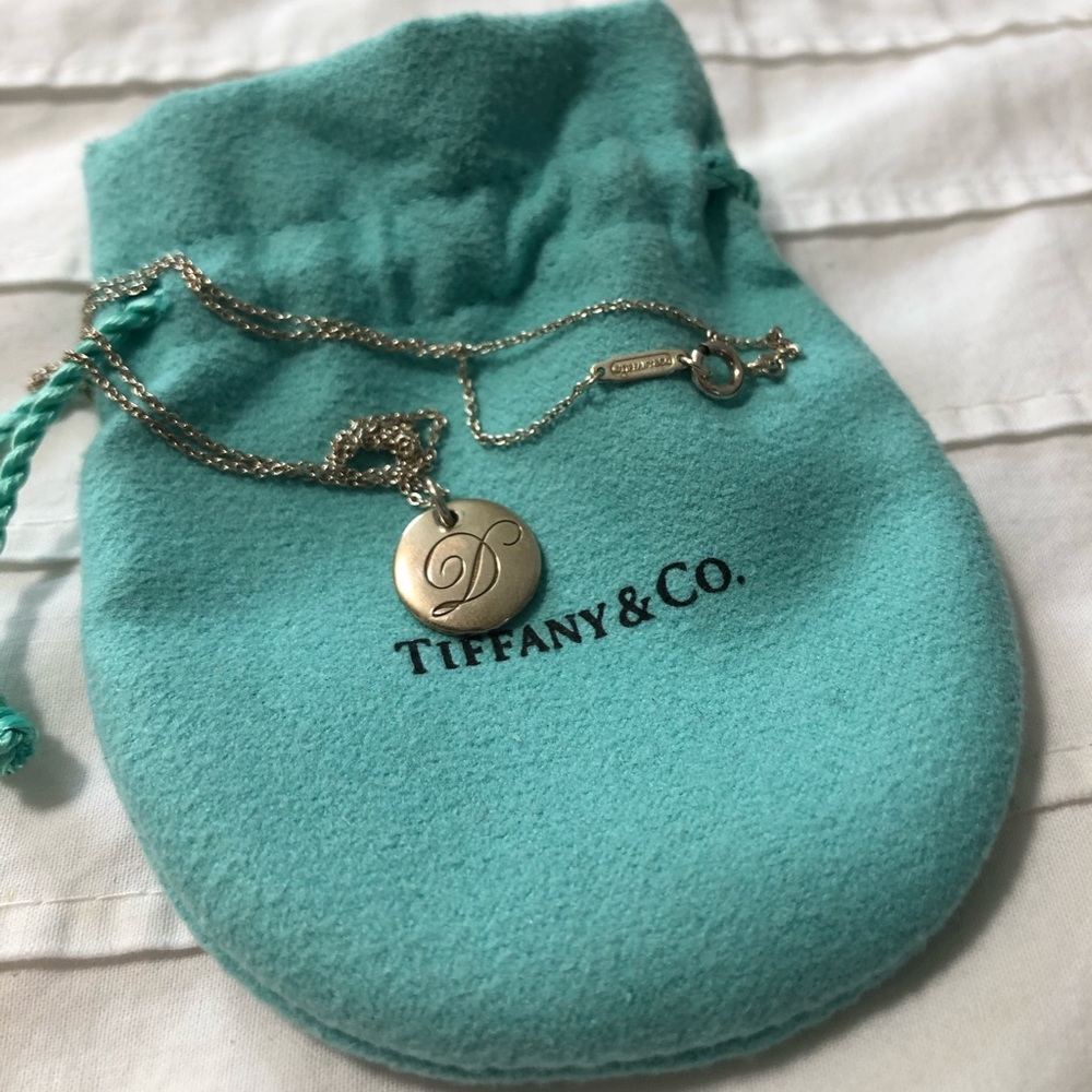 Tiffany & Co circle “D” necklace